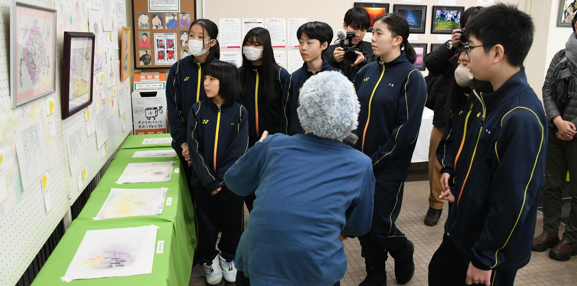 展示会場で初対面